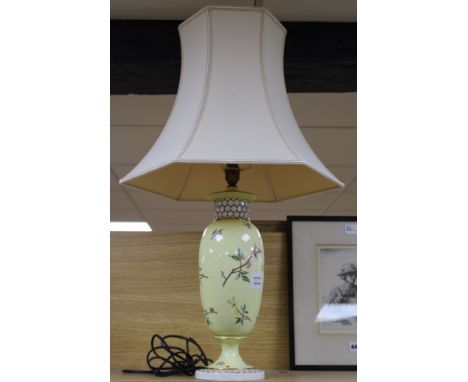 A Royal Worcester porcelain yellow ground table lamp