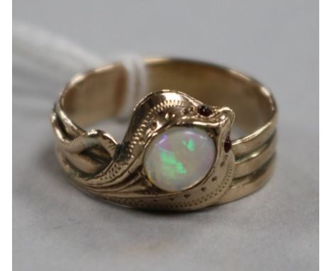 A yellow metal, white opal and gem set serpent ring, modelled as a King Cobra, size Q.