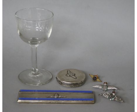R.A.F. related silver and enamel comb, 3 "wings" pins, a silver compact and a liqueur glass
