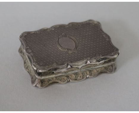 A Victorian engine turned silver vinaigrette by Thomas Dones, Birmingham, 1861, 44mm.