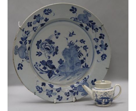 An English delftware blue and white dish, 14in. and a pearlware teapot