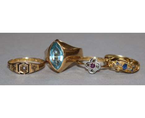 Three 18ct gold gem set rings and one 15ct gold gem set ring.