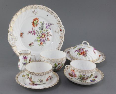 A Dresden thirty five piece tea service, painted with floral sprays