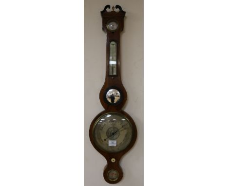 A Regency mahogany wheel barometer, by Mangiacavalli of Leather Lane, H.3ft 2in.