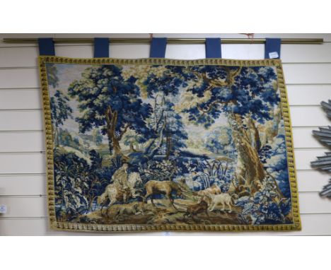 A needlework verdure tapestry, H.80cm, W.114cm