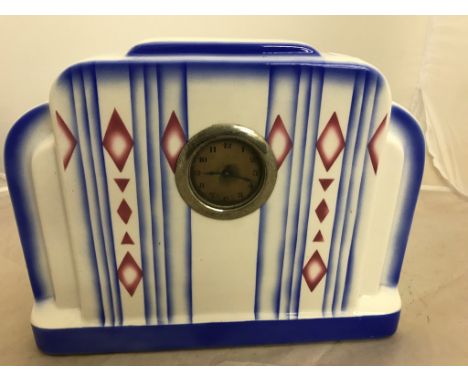 A Belgian Art Deco ceramic clock