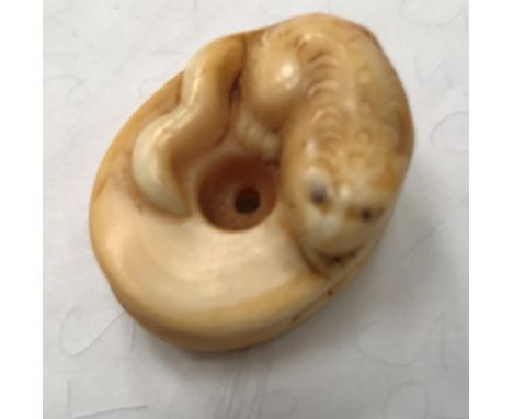 A Meiji period ivory netsuke