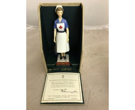A boxed Royal Worcester figure of the British Red Cross Society VAD member from the Nursing Sisters Series by Ruth and Raymon