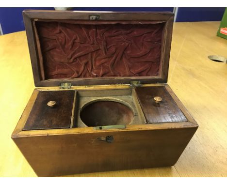 A Victorian mahogany sarcophagus-shaped tea caddy