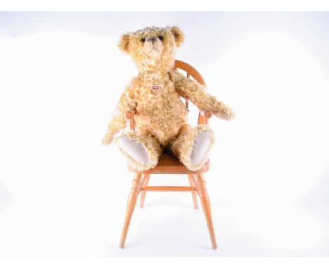 A large limited edition 2004 Steiff collector's bear, with golden plush jointed body, number 979 of 2004, 404153, 60cm, with 