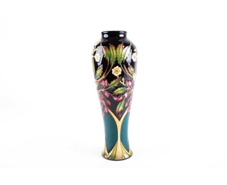 A Moorcroft Flower &amp; Berry pattern vase designed by Nicola Slaney, date cypher 2009, of slender tapering form, with bloss