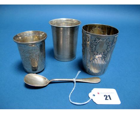 A XIX Century Tumbler, stamped "1879" and "84", acanthus leaf scroll decorated, 7.1cm high; An Engine Turned Beaker; a decora