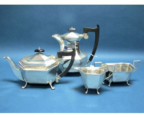 A Matched Hallmarked Silver Four Piece Tea Set, EV, Sheffield 1932, 1933, 1937, each of plain panelled  form, raised on four 