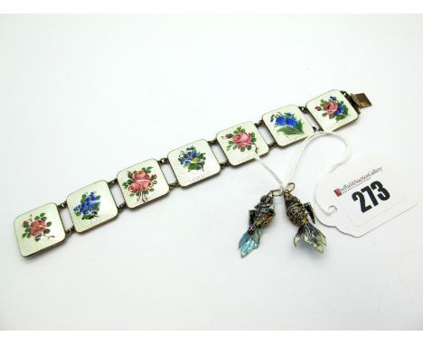 A Norwegian Enamel Panel Bracelet, each square panel highlighted with pink and blue flowers on a white ground, (one part deta