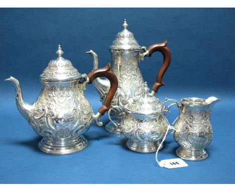 A Highly Decorative Matched Hallmarked Silver Four Piece Tea Set, CSLd, London 1975, 1976, of antique style, allover foliate 