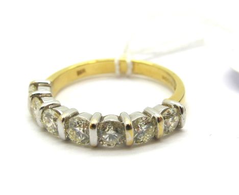 An 18ct Gold Seven Stone Diamond Half Eternity Style Ring, bar set throughout with uniform stones, approximate total diamond 