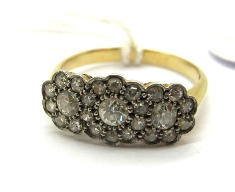 A Diamond Set Triple Cluster Ring, graduated set throughout.