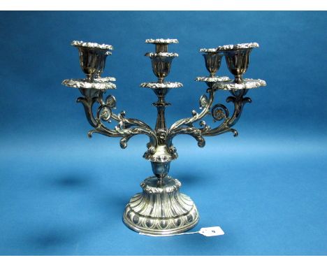 A Large Plated Four Branch Candelabrum, five lights, converting to a twin branch candelabrum or a single candlestick on circu