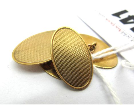 A Pair of 9ct Gold Gent's Cufflinks, the engine turned oval panels on chain connections.