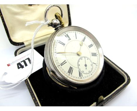 An Openface Pocketwatch, the dial with black Roman numerals and seconds subsidiary dial, within engine turned case, stamped "