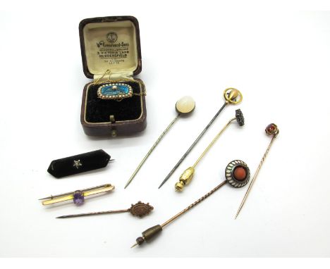 Charles Horner; A 9ct Gold Long Stick Pin, of circular openwork design, a Chester hallmarked 9ct gold oval stick pin of Victo