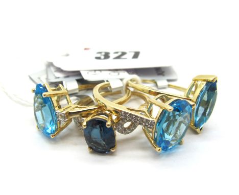 The Genuine Gemstone Company; A Modern 9ct Gold Dress Ring, a large oval claw set centre, within inset shoulders; another sim