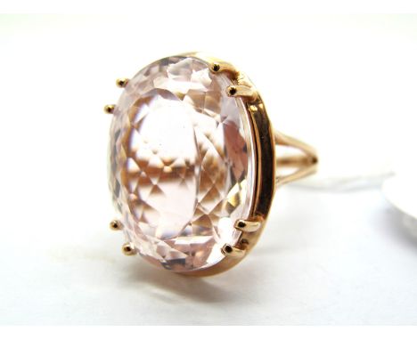 A Large Modern 14ct Rose Gold Single Stone Dress Ring, oval eight claw set high in openwork setting.