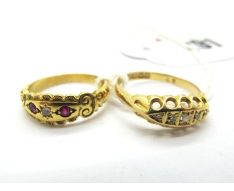 An 18ct Gold Victorian Style Dress Ring, with graduated inset highlights, within boat shape open work setting, and textured s