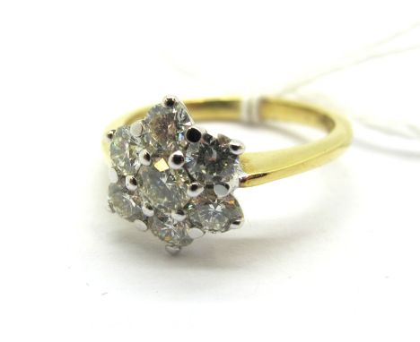 An 18ct Gold Diamond Cluster Ring, of flowerhead design, claw set.