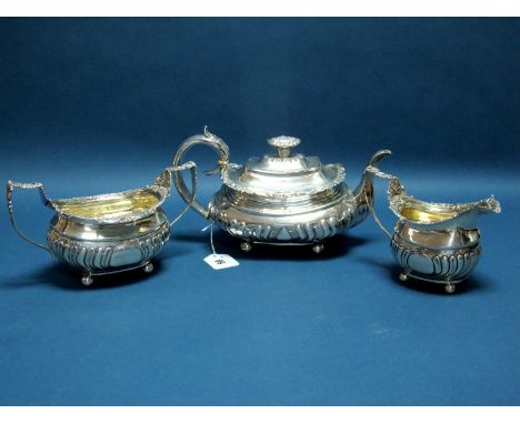 A Matched Hallmarked Silver Three Piece Tea Set, (makers marks rubbed) jug and sugar bowl London 1817, teapot London 1821, ea