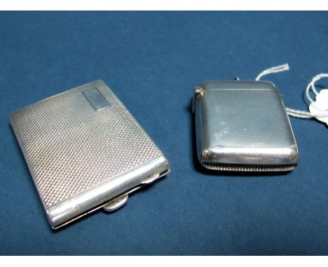 A Chester Hallmarked Silver Match Book Case; T&amp;S, Chester 1926, allover engine turned; A Chester Hallmarked Silver Vesta 