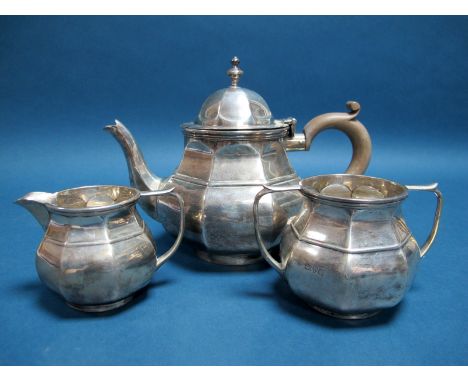 A Matched Hallmarked Silver Three Piece Tea Set, George Nathen &amp; Ridley Hayes, Birmingham, Chester 1915, each of octagona