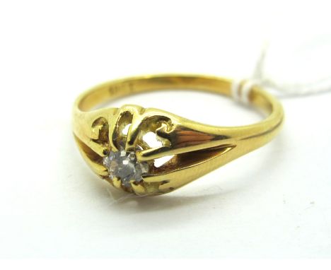 A Gents Single Stone Diamond Ring, the brilliant cut stone claw set, between openwork setting and reeded shoulders, stamped "