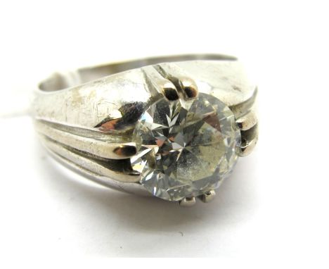 A Large Gent's Single Stone Diamond Ring, the (9mm) old brilliant cut stone reeded claw set, stamped "750".