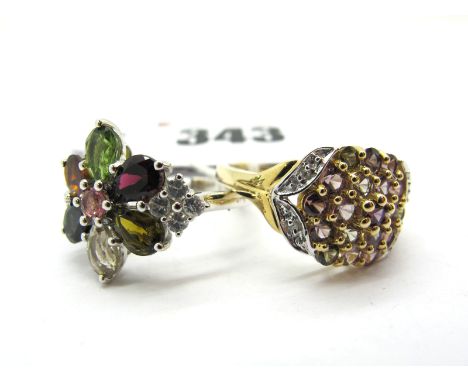 The Genuine Gemstone Company; A Modern 9ct White Cluster Dress Ring, multi stone claw set, of flower head design, between pla