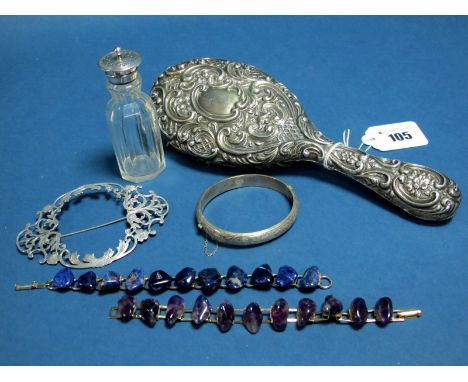 A Hallmarked Silver Backed Hair Brush, together with a large openwork brooch of scroll design, a hallmarked silver bangle, gl