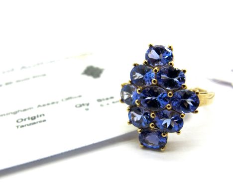 A Modern 9ct Gold Tanzanite Cluster Dress Ring, claw set throughout with oval cut stones, limited edition of 74 pieces, compl