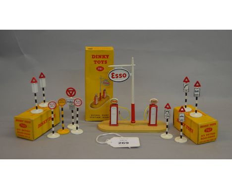 Three Dinky Toys: #781 Petrol Pump Station Esso; #769 Six British Road Signs Town Set B; #767 Six British Road Signs Country 