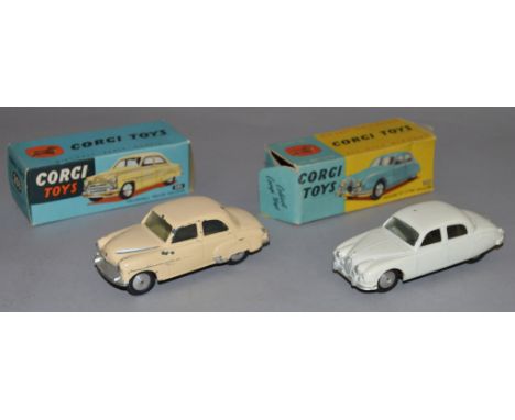 Two Corgi Toys, #203 Vauxhall Velox Saloon in  cream and 208 Jaguar 2.4 litre Saloon in white. The 208 model comes in a blue 