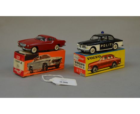 Two Tekno diecast model cars: #825 Volvo P1800 in red; #810 Volvo 121/122 S Politi. Both boxed. (2)
