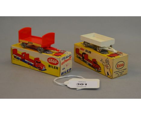 Two Lego Biler plastic vehicles: #1252 Esso Bedford Trailer in red; #1254 Bedford Flatbed Trailer in white. Both boxed. (2)