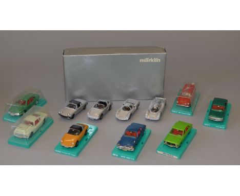 7 Marklin diecast model cars (3 with complete boxes), together with a Marklin gift set containing 4 Silver Porsche models. (8