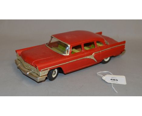 Unknown friction-drive model car, plastic body and lithographed tin-plate interior. 25cm in length.