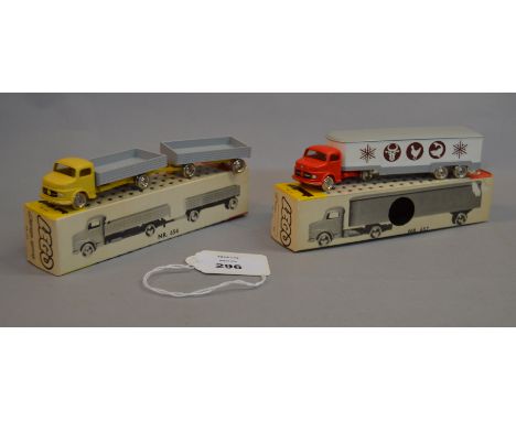 Two Lego plastic vehicles: #654 Flatbed Truck with Trailer with yellow cab and chassis and grey flatbeds; #657 Long Covered V