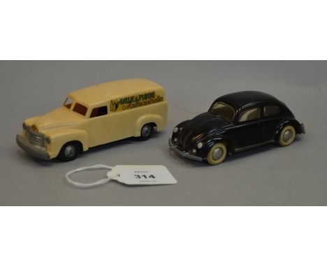Two early LEGO plastic vehicles: MAELK & FLODE friction-powered van and a black VW Beetle. Unboxed.