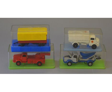 4 x Vilmers Toys trucks (made in Denmark) all boxed, including a yellow covered wagon, white ambulance, red truck with extend