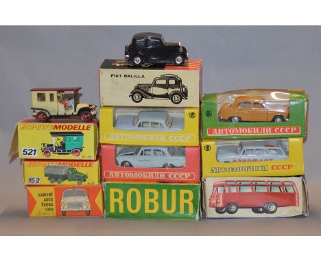 10 assorted diecast and plastic continental model cars. All boxed.