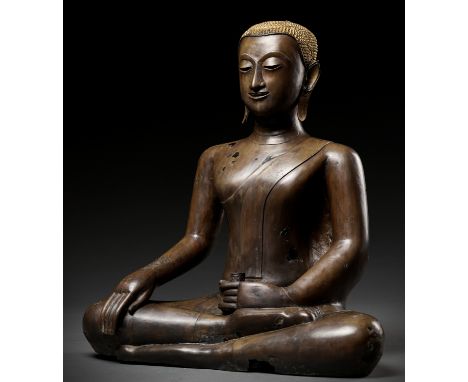 A LARGE BRONZE STATUE OF BUDDHA SHAKYAMUNI, 16TH-17TH CENTURYThailand, Ayutthaya. Seated in sattvasana with his right hand in