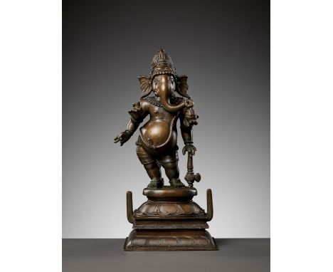 A BRONZE FIGURE OF GANESHA, 17TH-18TH CENTURYSouth India. Standing in tribhanga on a waisted lotus base over a stepped plinth