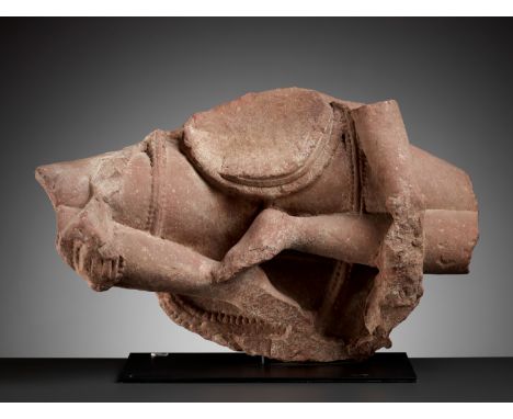 A MATHURA SANDSTONE FRAGMENT OF BUDDHA, KUSHAN PERIODCentral India, 2nd century AD. Well carved seated in dhyanasana, the leg